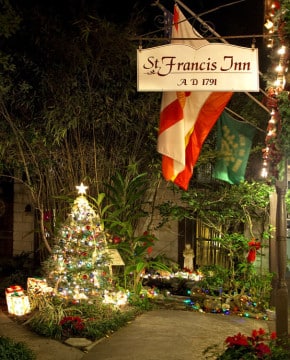 Celebrate the Holidays with us! 1 Christmas tree and decorations in St Francis Inn's courtyard